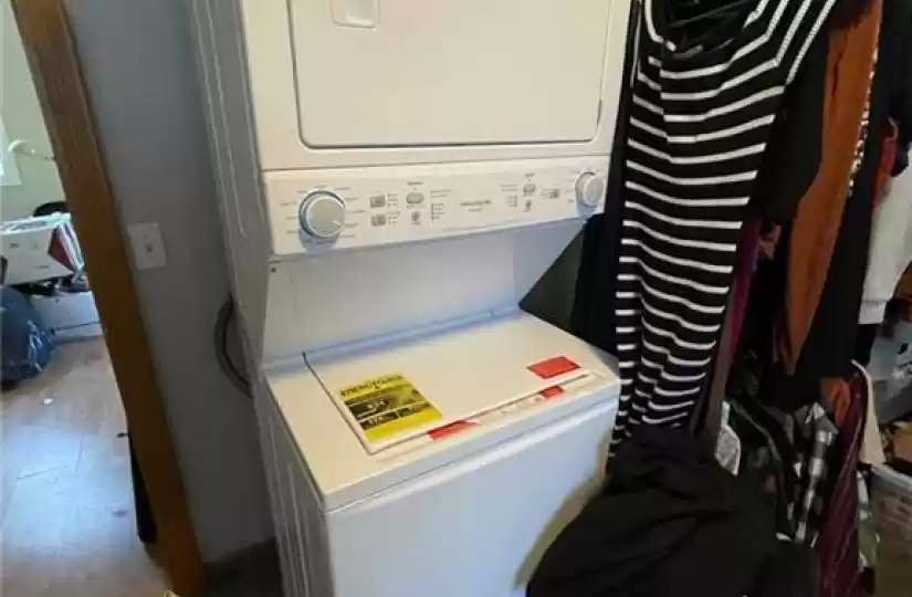 Stackable washer and dryer are included in the sale. Laundry is located in the bedroom. Note: The water heater is located in the closet of the bedroom.