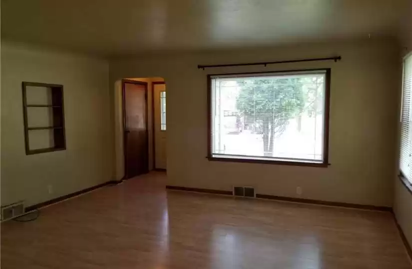 Living room / Front entry has laminate flooring