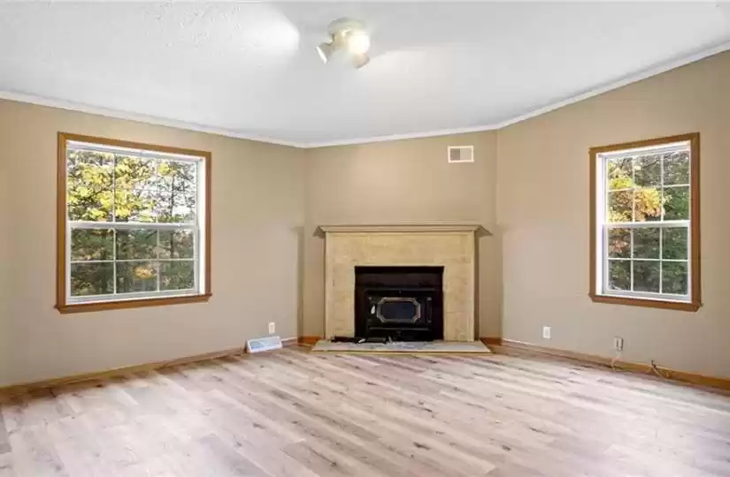 Large main ffloor family room with wood burning fireplace
