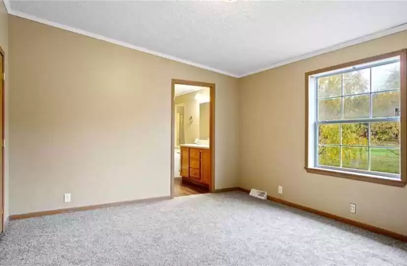 Large main bedroom has two closets and private bathroom
